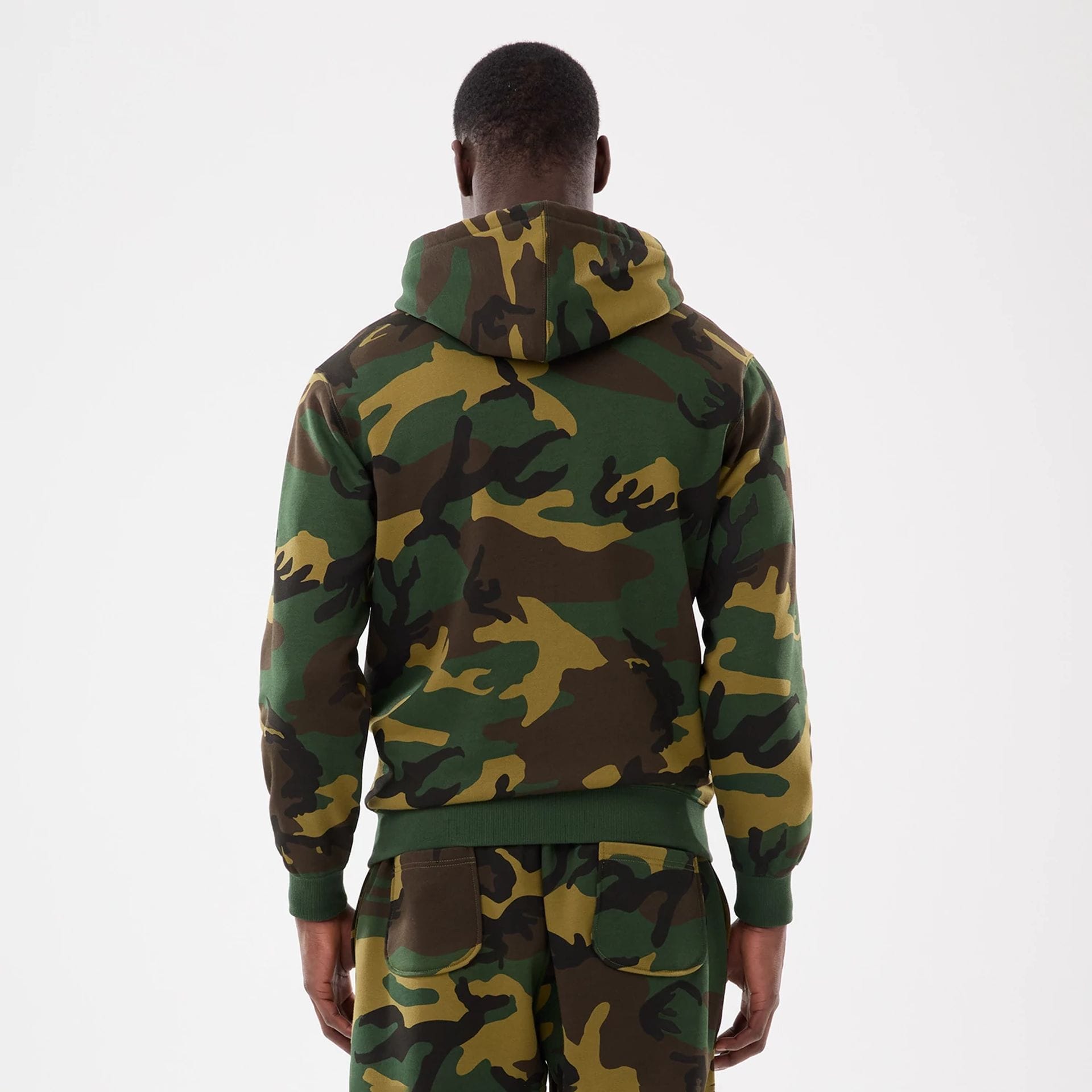 The model is wearing this MLB Camo New York Yankees 2 Way Full Zip Hoodie in Woodland Camo. 2