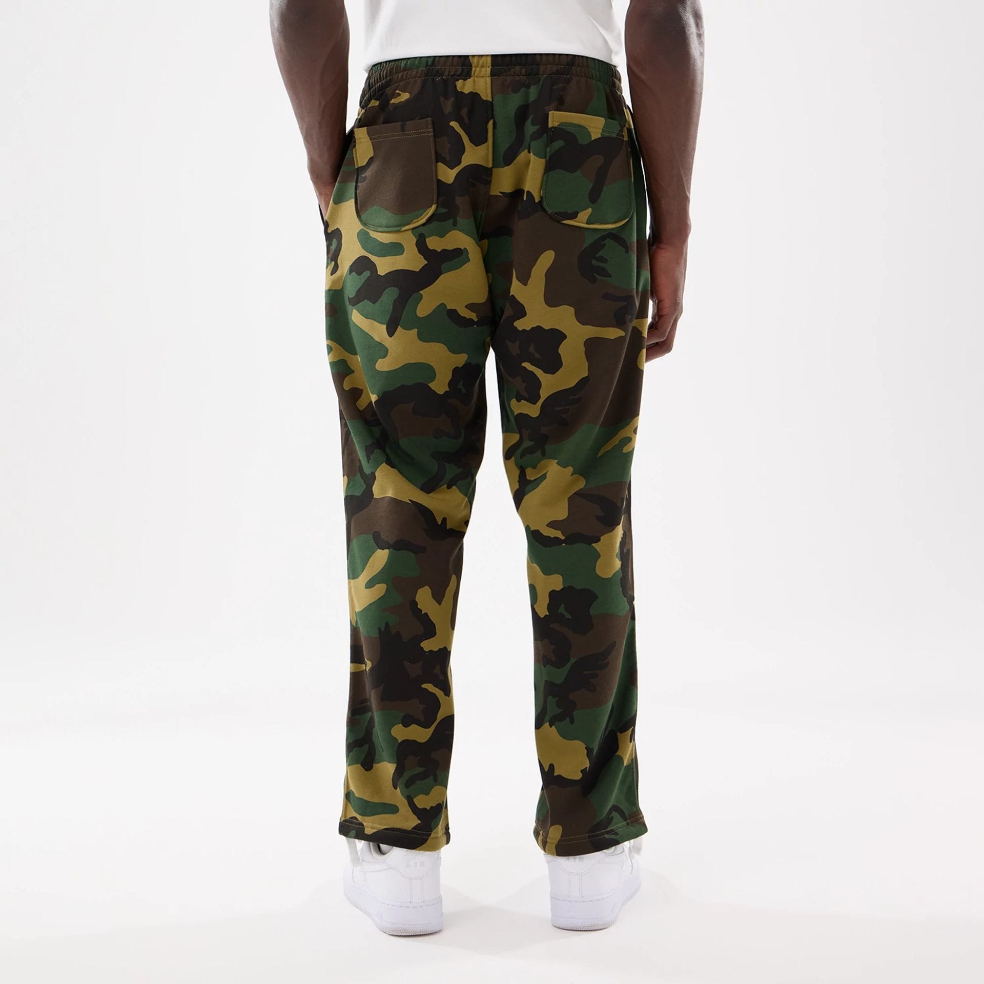 The model is wearing this New Era Woodland Camo Joggers in Woodland Camo. 2