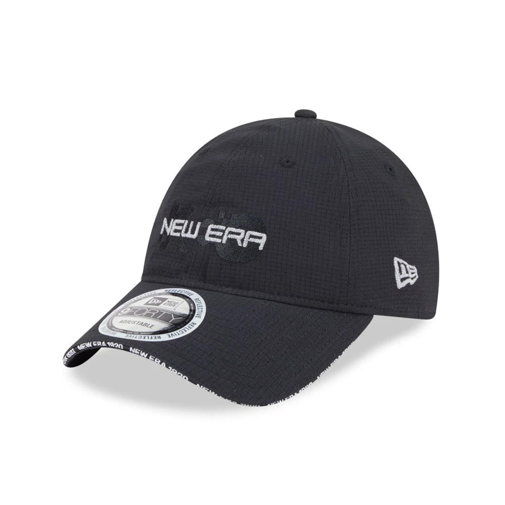 New Era NEC Logo Black New Era 9FORTY Unstructured Adjustable Cap, three-quarter view showing the white raised New Era logo on the front panel, the New Era flag logo on the left side, and the 9FORTY size sticker on the visor.