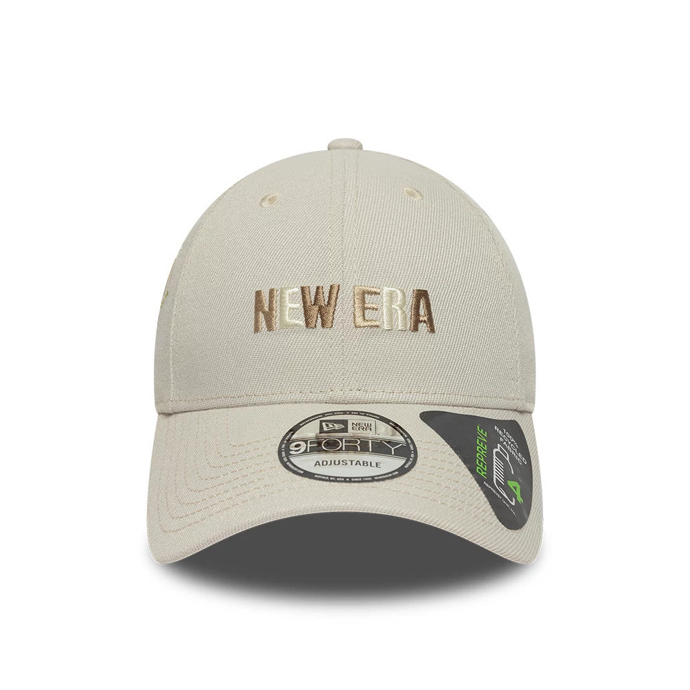 New Era Earth Day Beige New Era 9FORTY Adjustable Cap, front view showing raised New Era lettering in gold and white embroidery on the front panel, beige curved visor with 9FORTY size sticker, and top button.
