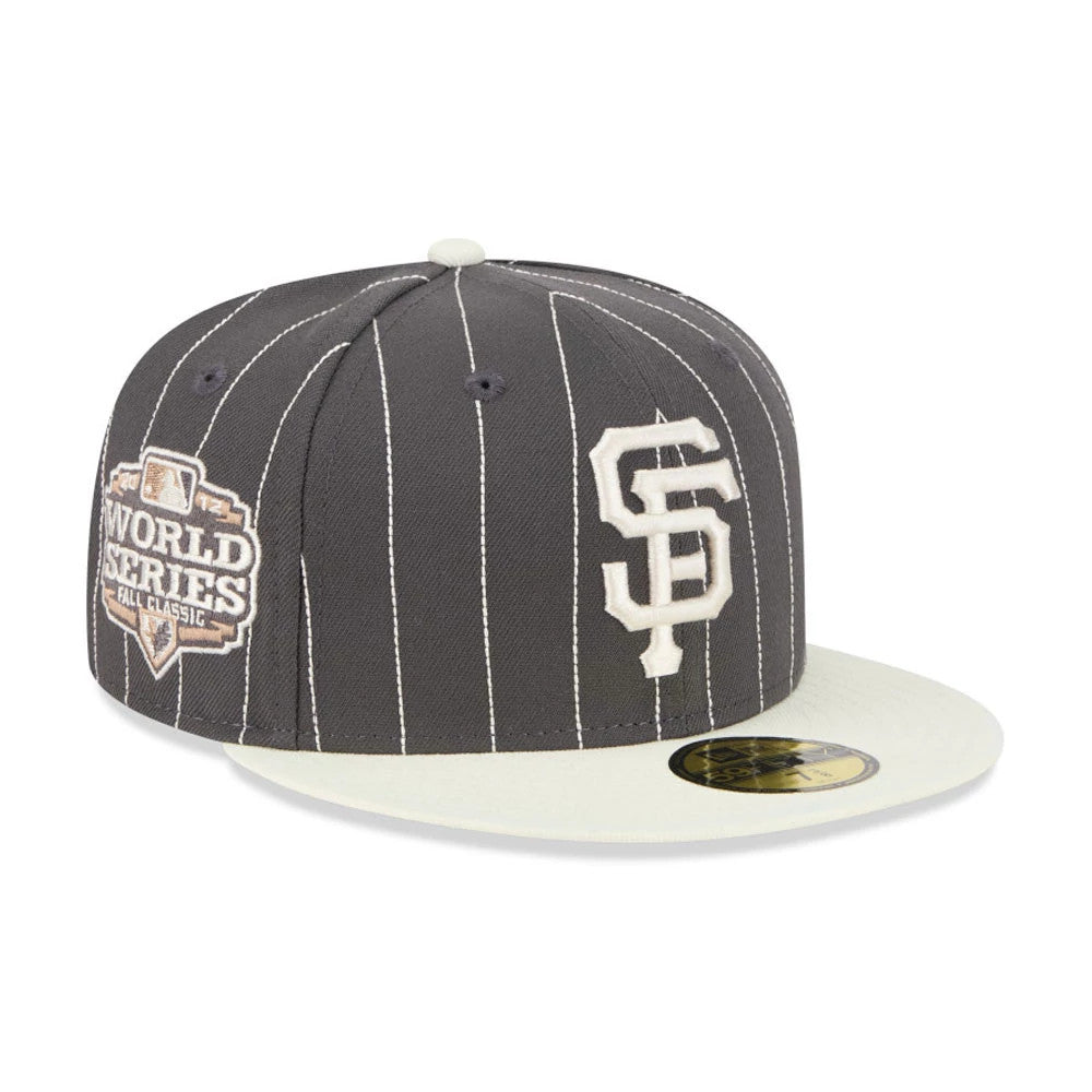 San Francisco Giants MLB Stripes Dark Grey New Era 59FIFTY Fitted Cap, front view with the white embroidered SF logo on the front panel, World Series patch on the right side, and a contrasting light visor with a gold 59FIFTY size sticker.