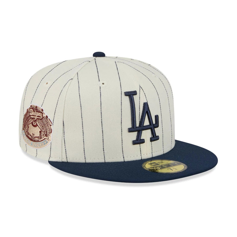 LA Dodgers MLB Stripes Cream New Era 59FIFTY Fitted Cap, front view showing the raised navy LA logo on the front panel, navy visor with gold 59FIFTY size sticker, and brown World Series patch on the right side.
