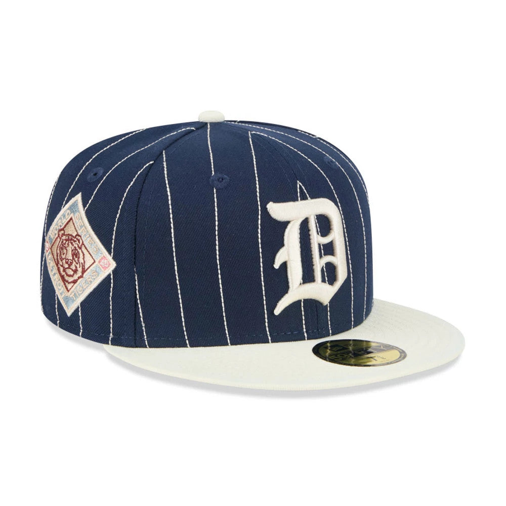 Detroit Tigers MLB Stripes Dark Blue New Era 59FIFTY Fitted Cap, three-quarter view with a white embroidered D logo on the front panel, a patch on the side, and a contrasting white visor with a gold 59FIFTY size sticker.