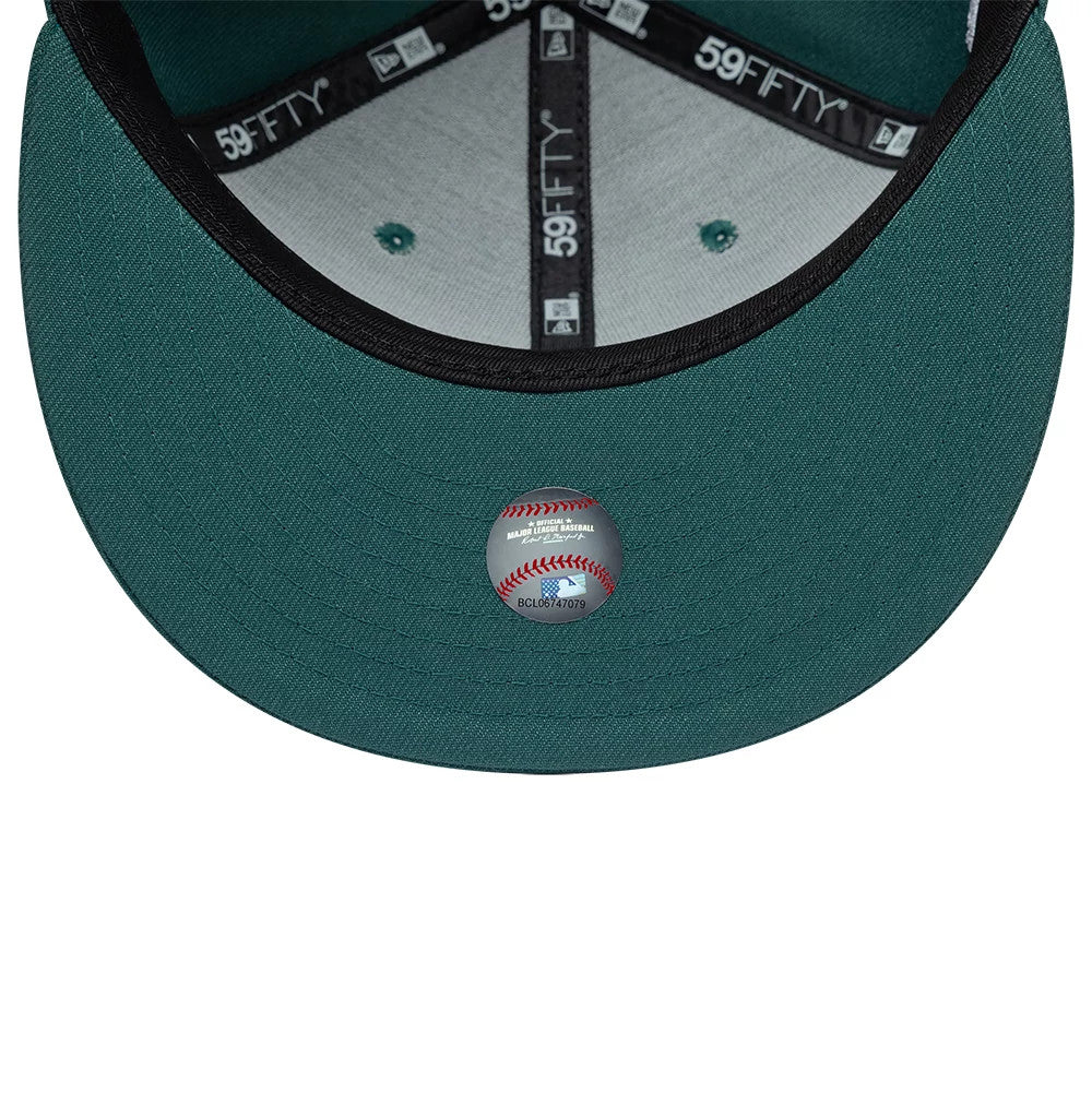 New York Yankees MLB Garden Dark Green New Era 59FIFTY Fitted Cap, inside view showing black taping with 59FIFTY branding, a grey sweatband, and a sticker on the dark green undervisor featuring a baseball design.