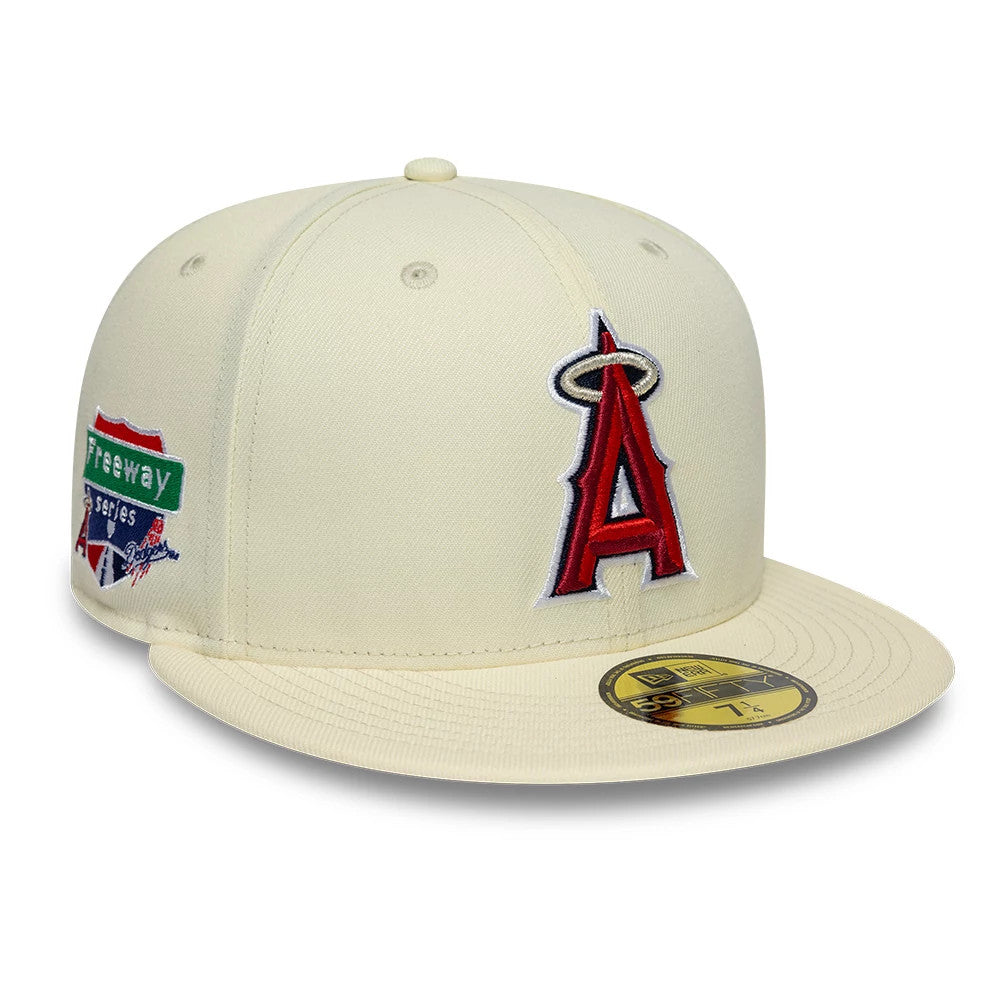 LA Angels MLB City Series White New Era 59FIFTY Fitted Cap, front view showing a raised red A logo with silver border on the front panel, a Freeway Series side patch, and a gold 59FIFTY size sticker on the visor.
