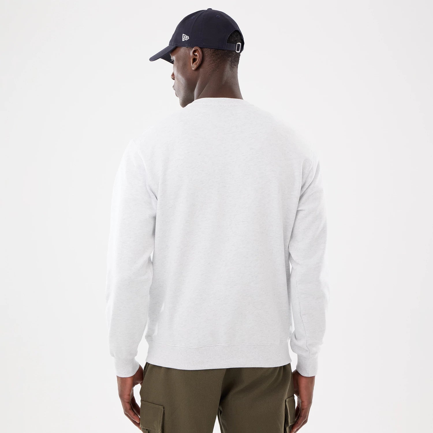 The model is wearing this MLB Retro New York Yankees Oversized Crew Neck Sweater in White 2