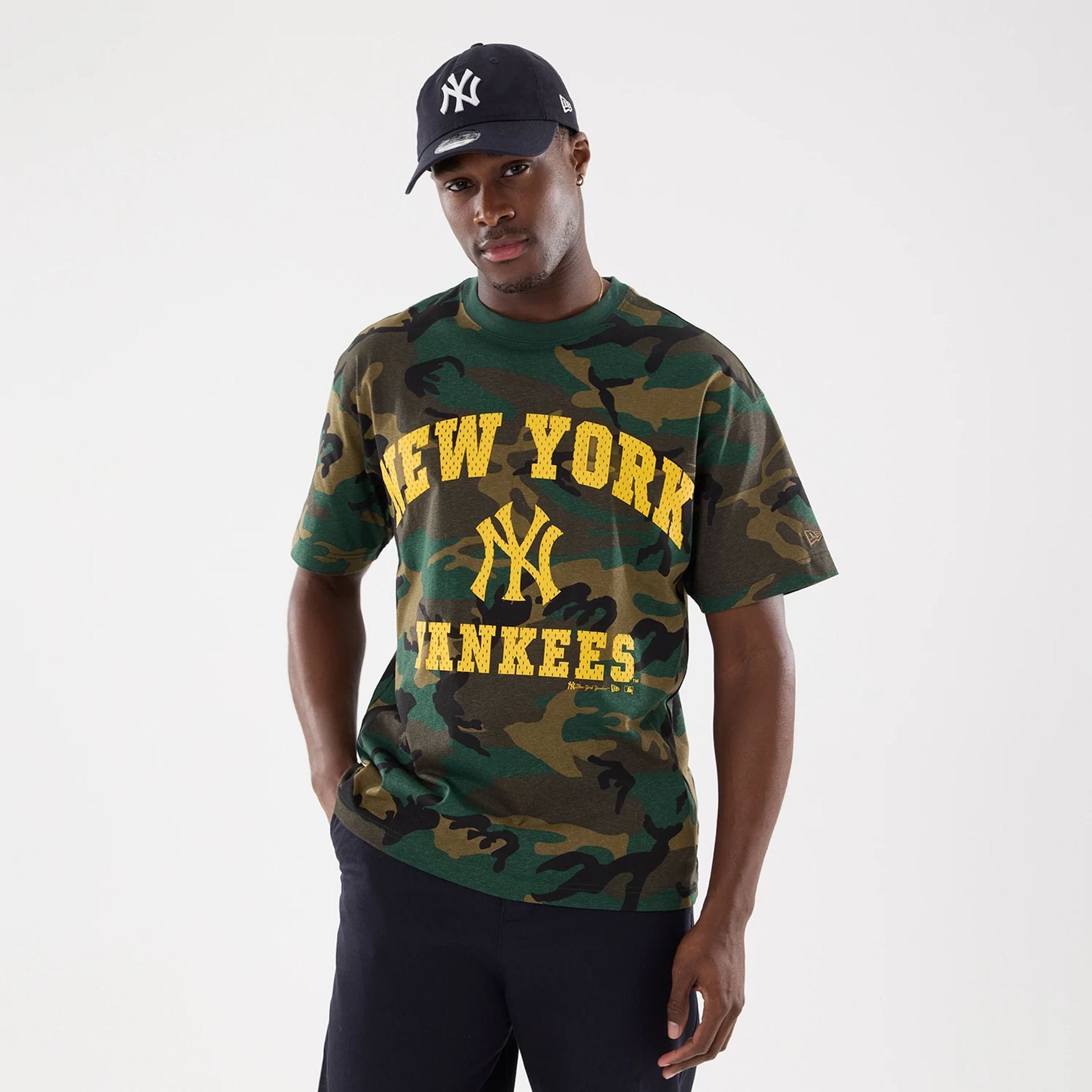 The model is wearing this MLB Camo New York Yankees T-Shirt in Woodland Camo. 1