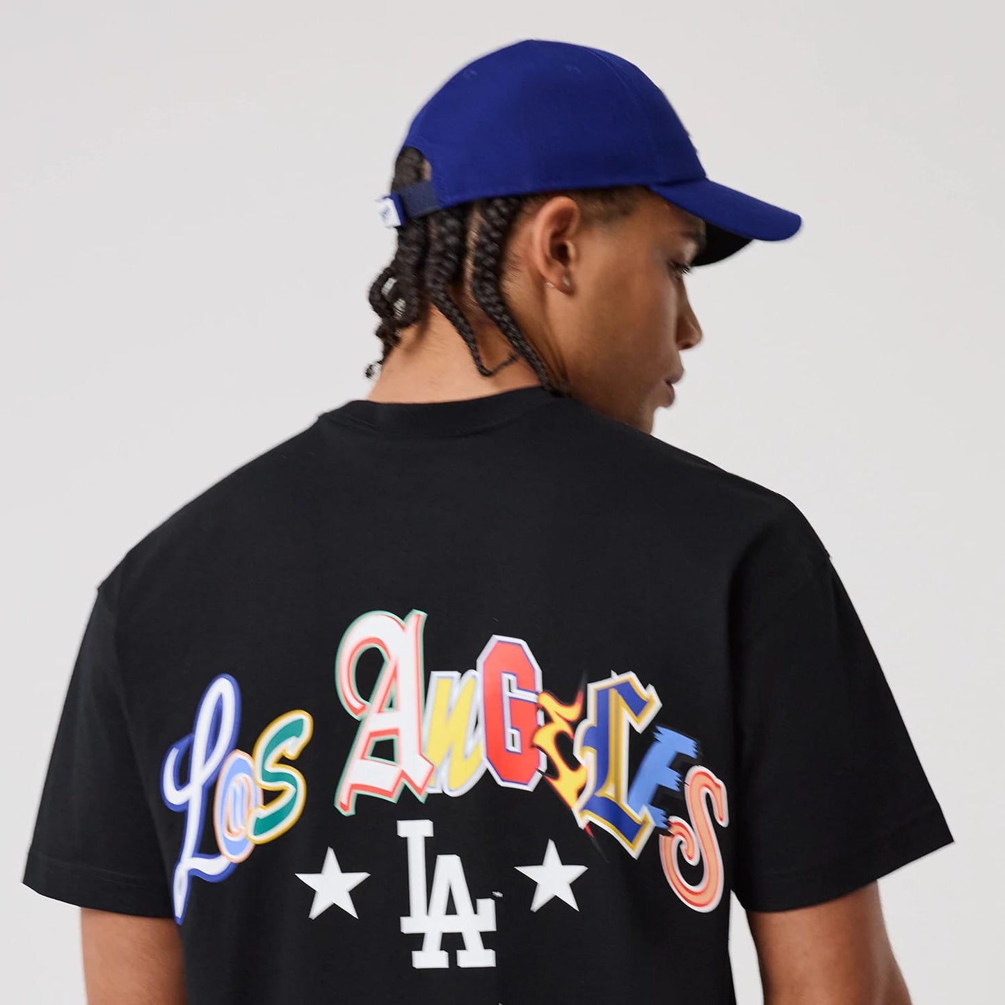 The model is wearing this MLB Word Art LA Dodgers T-Shirt in black. 7