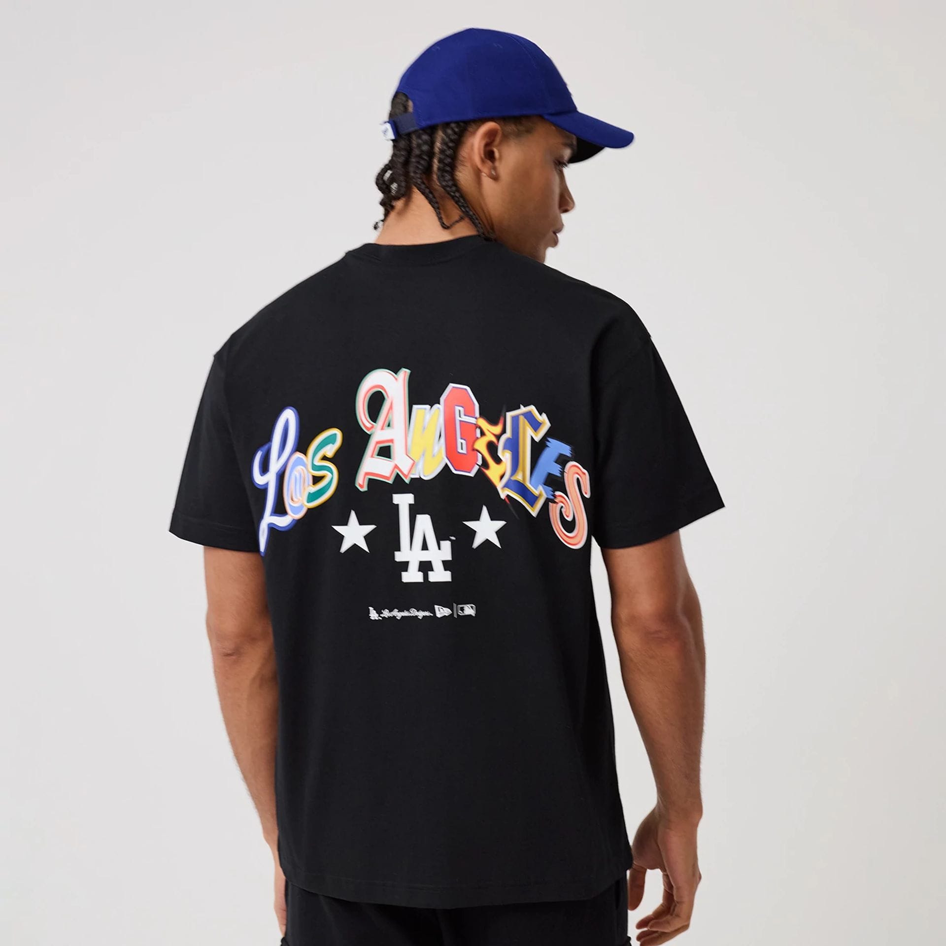 The model is wearing this MLB Word Art LA Dodgers T-Shirt in black. 2