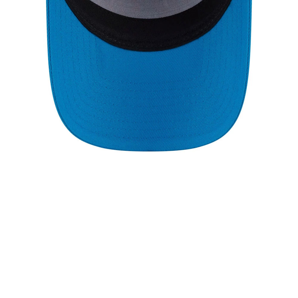 Rick And Morty White New Era 9FORTY A-Frame Adjustable Cap, inside view showing the black undervisor, blue visor, and contrasting white taping across the structured crown interior.