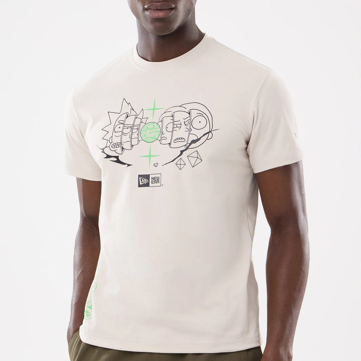 Rick And Morty Character Stack Cream T-Shirt, front view showing black outlined characters across the chest with a green geometric pattern, a raised New Era logo below and additional patterns near the lower left hem.
