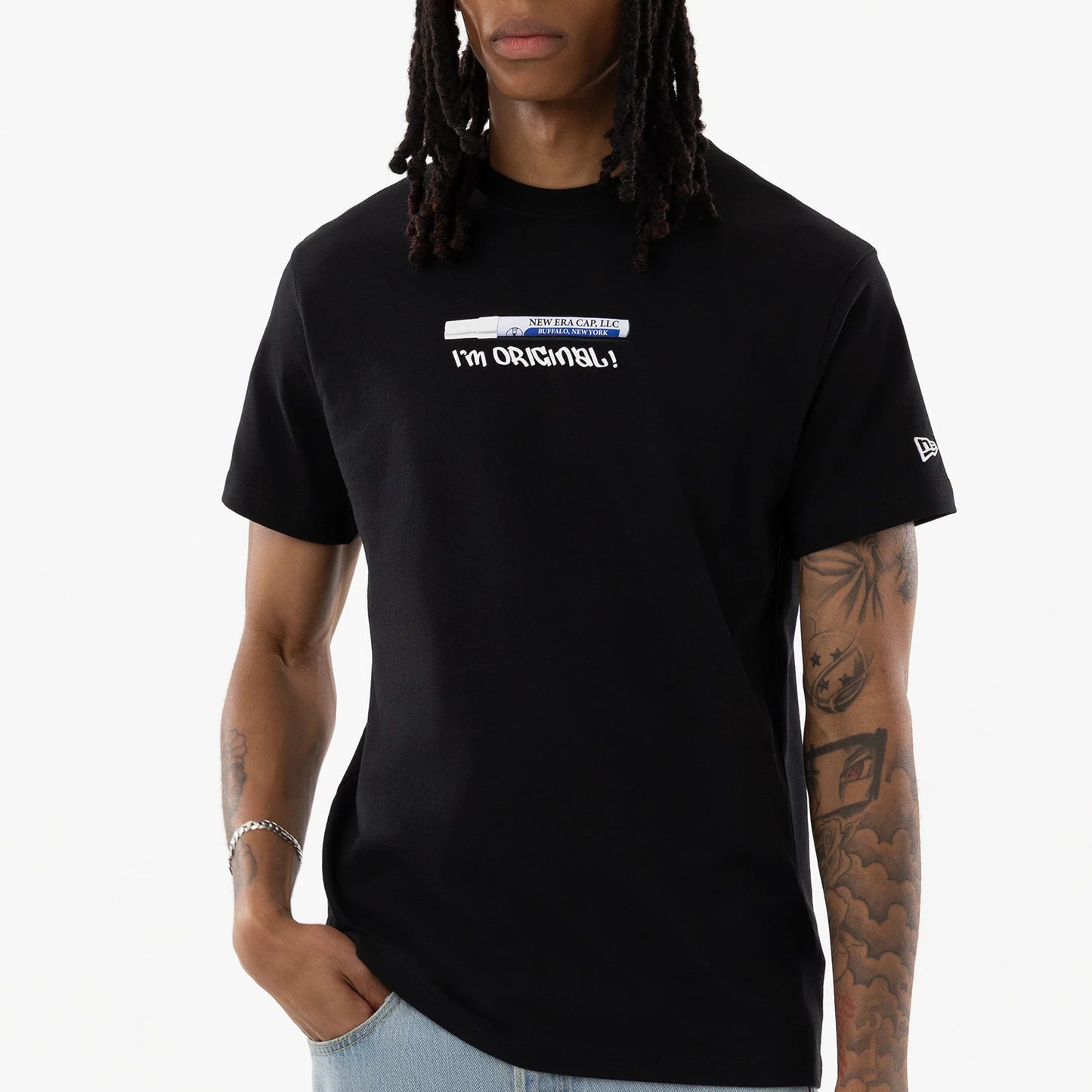 The model is wearing this New Era I Am Original T-Shirt in black. 7