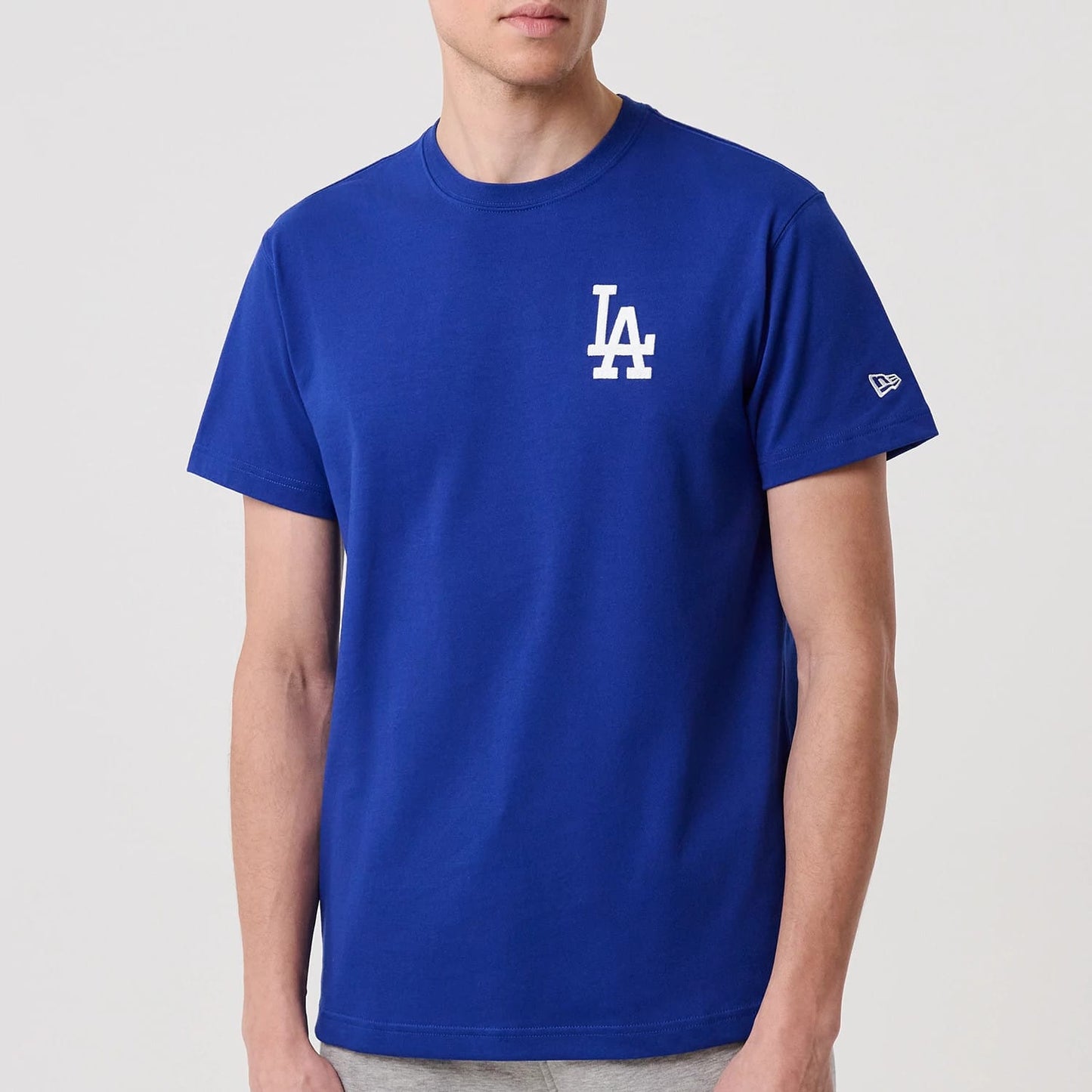 The model is wearing this MLB Banana Graphic LA Dodgers T-Shirt in bright blue. 7