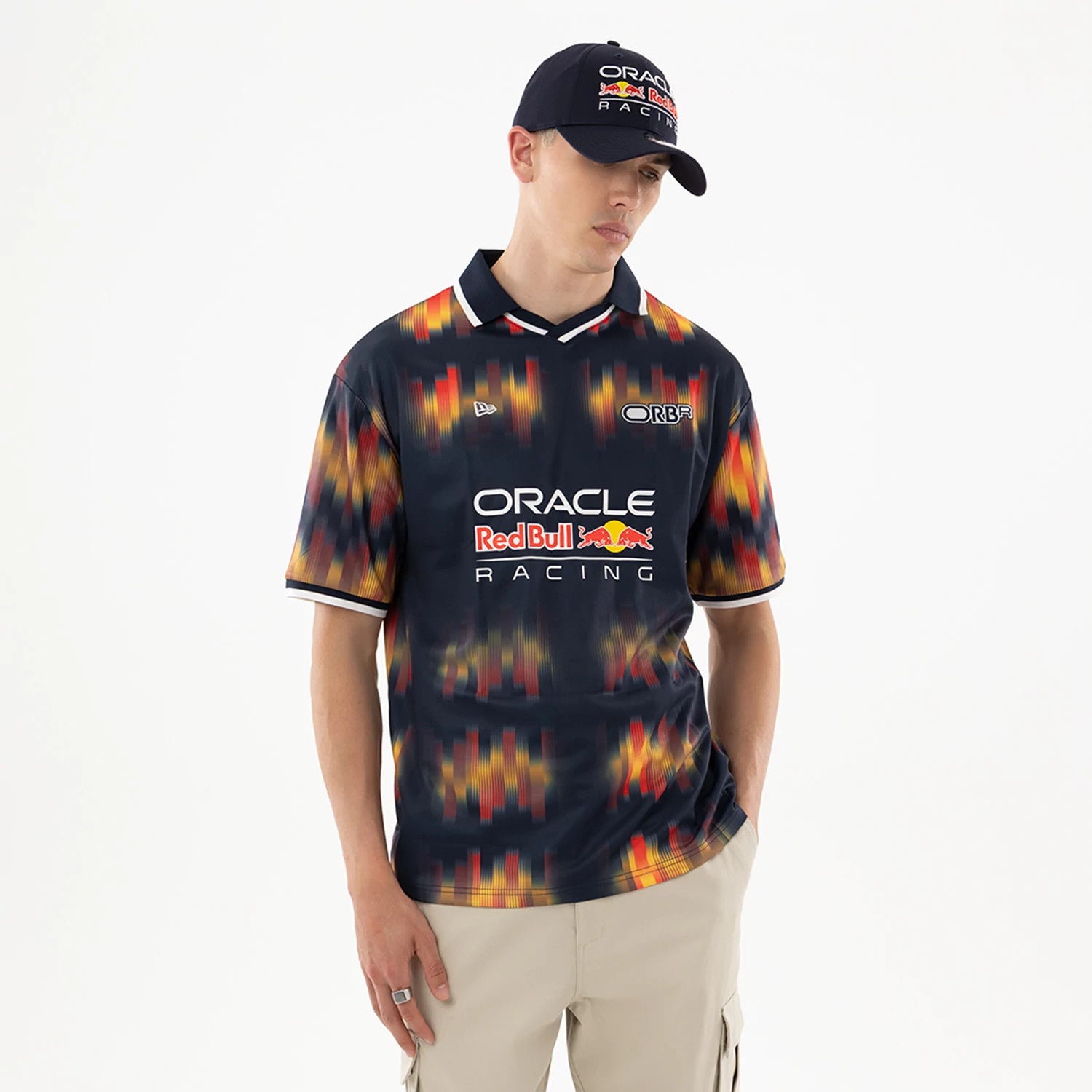 The model is wearing this Red Bull Racing Soccer Jersey in multi. 1