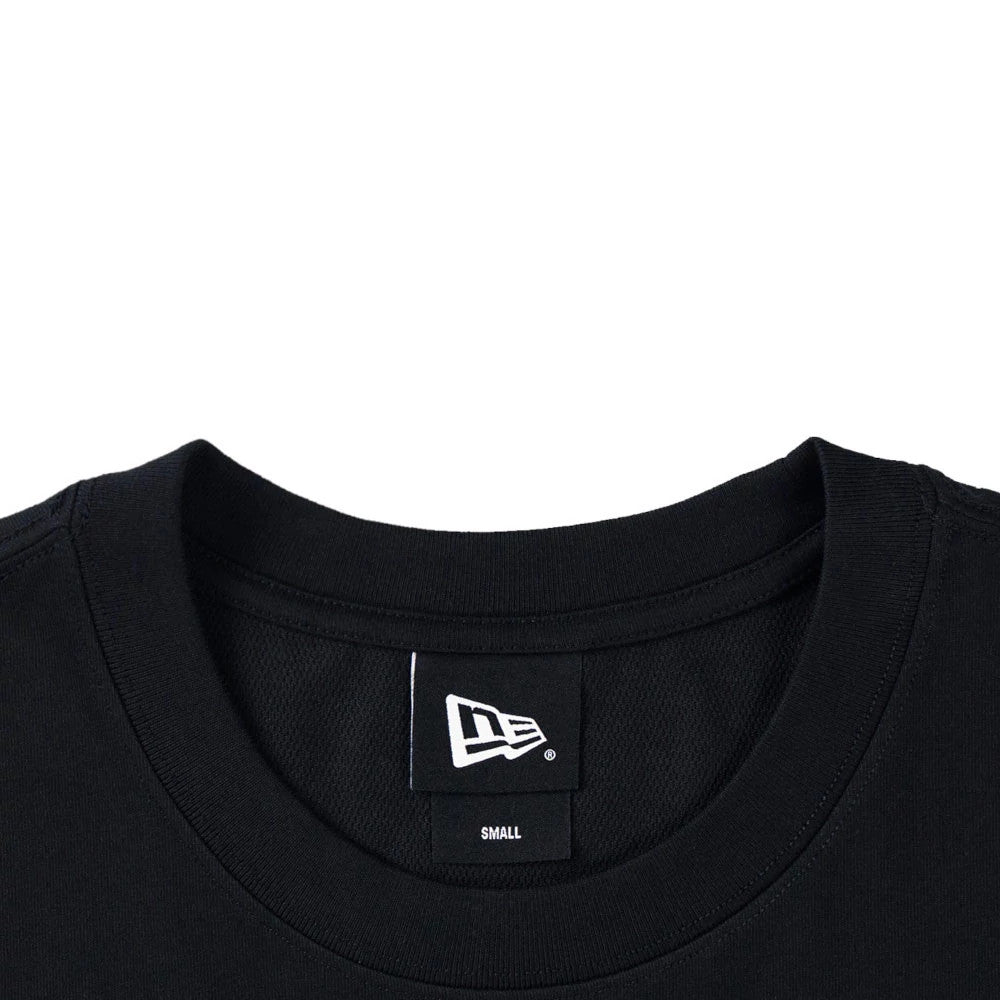The model is wearing this New Era Skate Is Life Graphic Oversized T-Shirt in black. 4