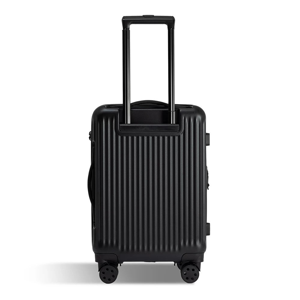New Era Black Wheeled Cabin Case, rear view showing the raised black handle fully extended above the ribbed black exterior, with four wheels fixed to the bottom corners for ease of movement.