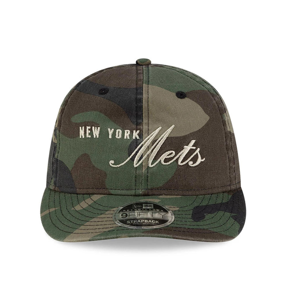 New York Mets Thisisneverthat X MLB Woodland Camo Retro Crown New Era 9FIFTY Cap, front view showing the cream embroidered New York Mets lettering on the camouflage pattern, with a 9FIFTY size sticker on the camo visor.