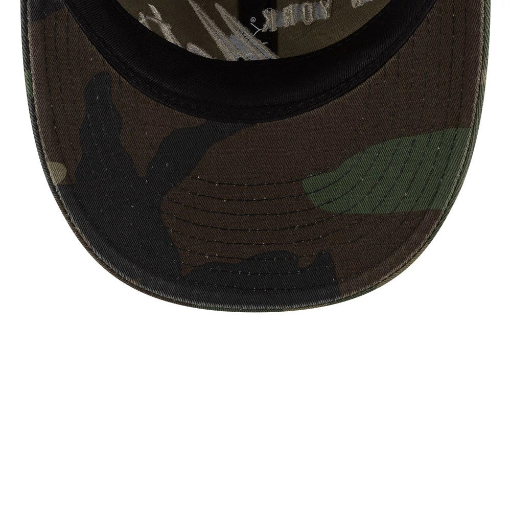 New York Mets Thisisneverthat X MLB Woodland Camo Retro Crown New Era 9FIFTY Cap, inside view showing green and brown camo pattern on the visor, with black taping and a grey sweatband around the interior edge.