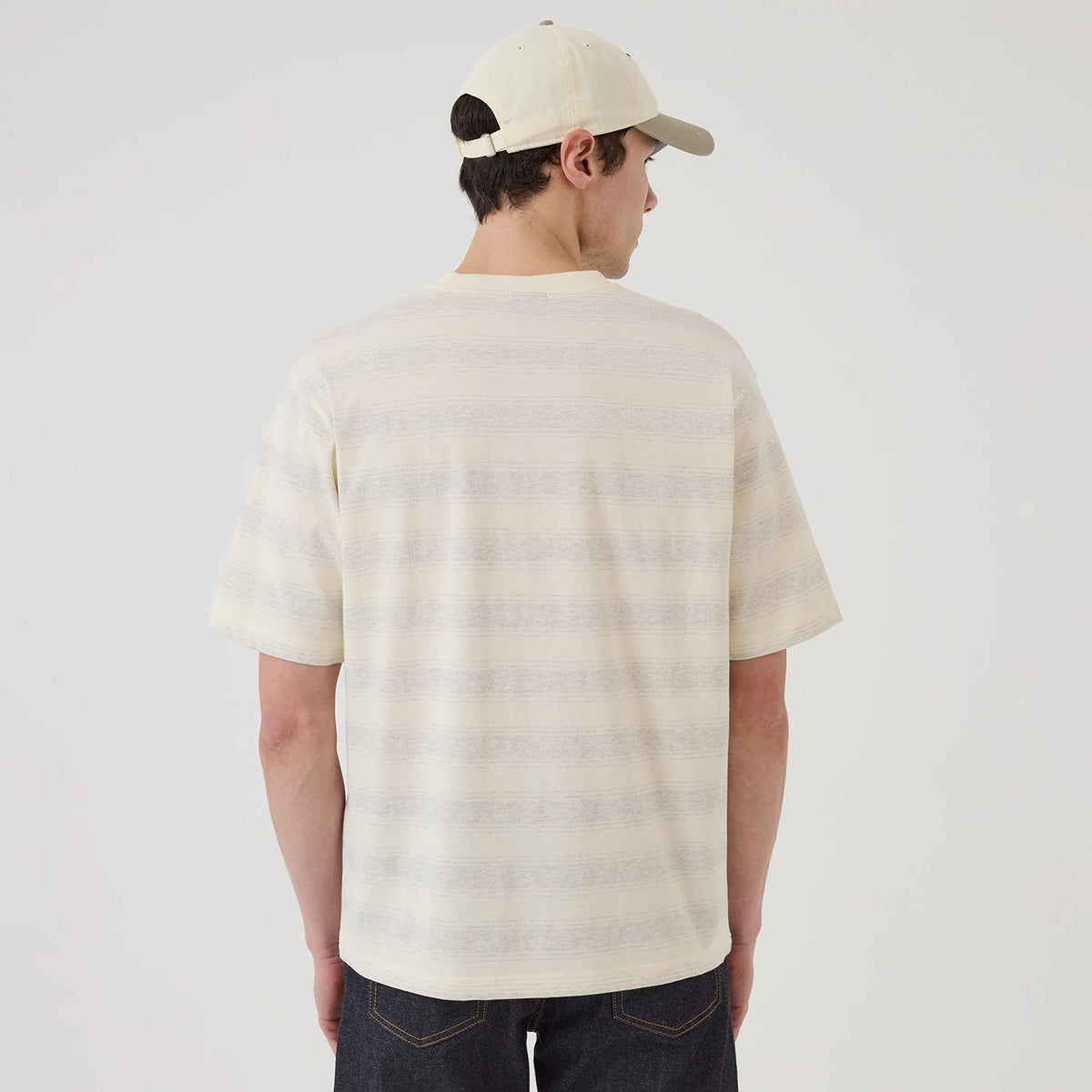 LA Dodgers MLB Border Cream Oversized T-Shirt, rear view showing the wide cream and grey striped pattern across the back, short sleeves, and a light beige cap with a debossed logo on the back.