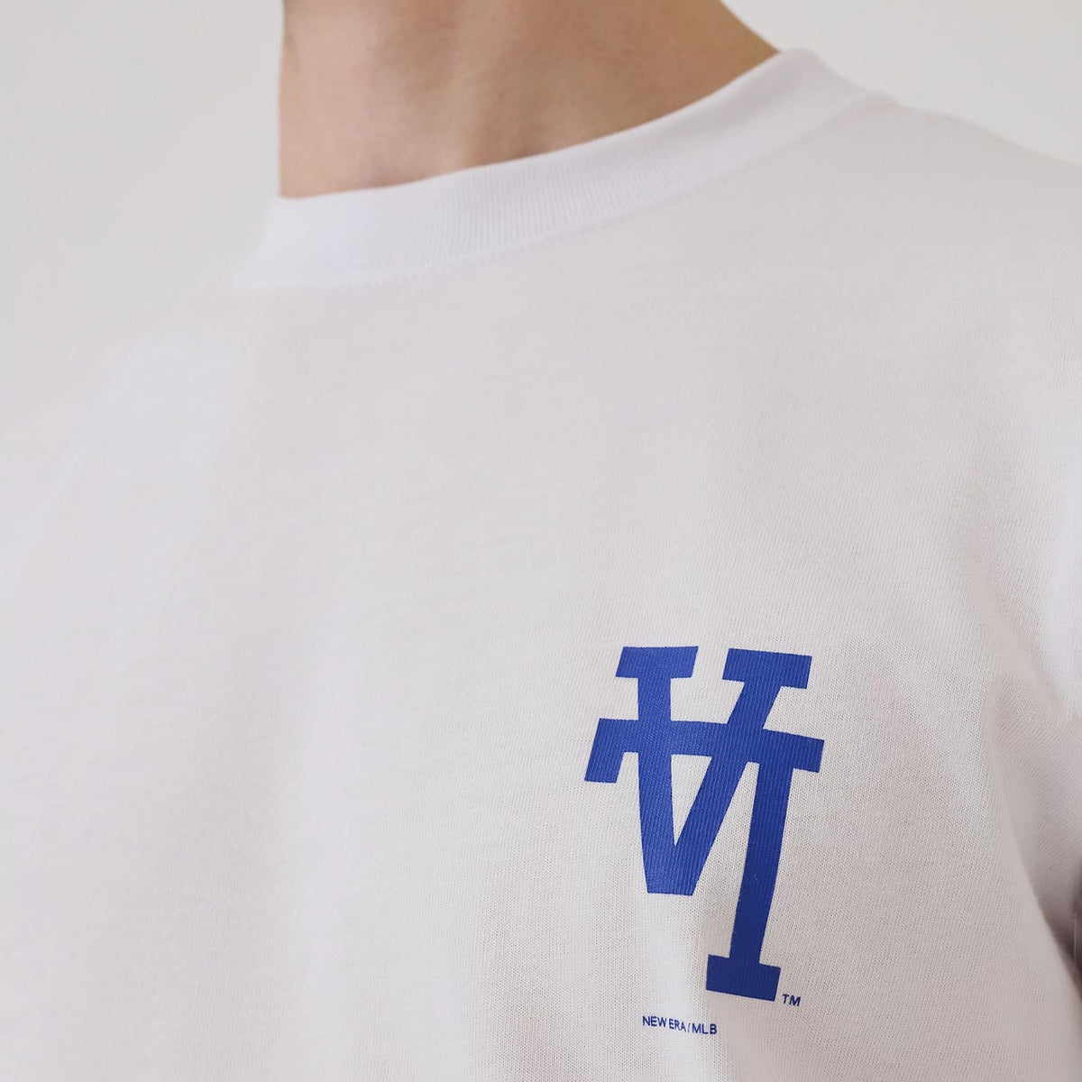 The model is wearing this MLB Upside Down LA Dodgers T-Shirt in white. 3