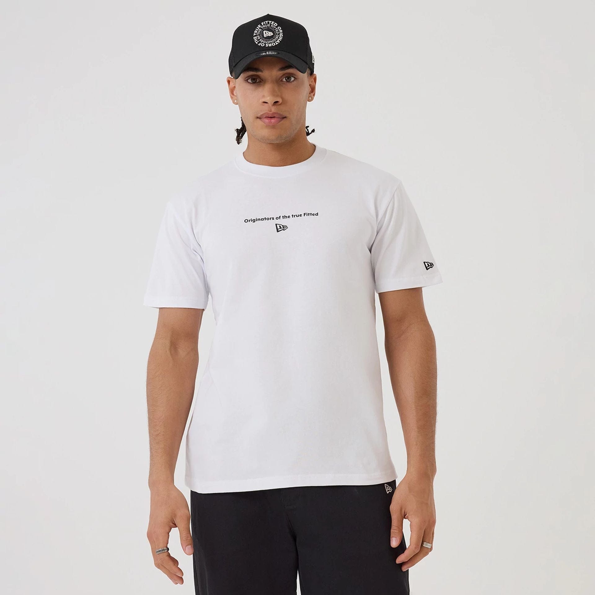 The model is wearing this New Era Circle T-Shirt in white. 1
