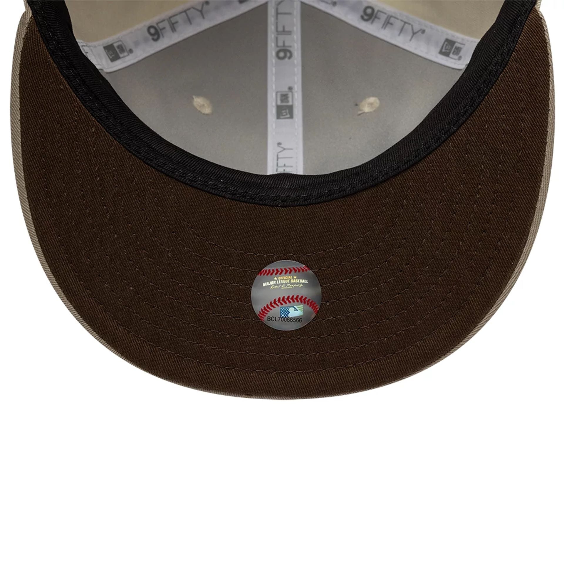 Pictured is this Hajime Sorayama X MLB San Diego Padres Retro Crown 9FIFTY cap in Cream. 2