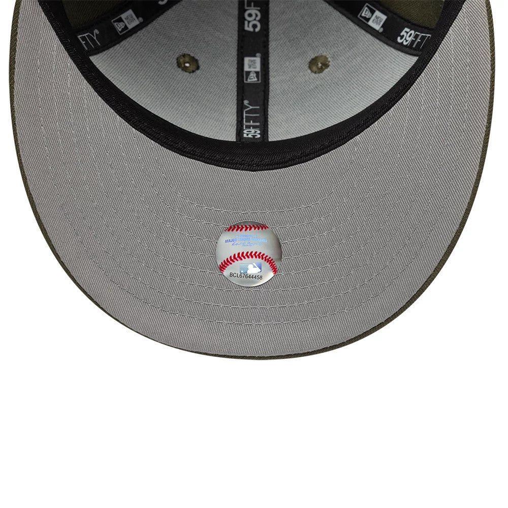 Seattle Mariners MLB College Varsity Dark Green Low Profile New Era 59FIFTY Fitted Cap, inside view showing grey taping and sweatband, with a baseball sticker on the underside of the grey undervisor, and contrasting stitching details.
