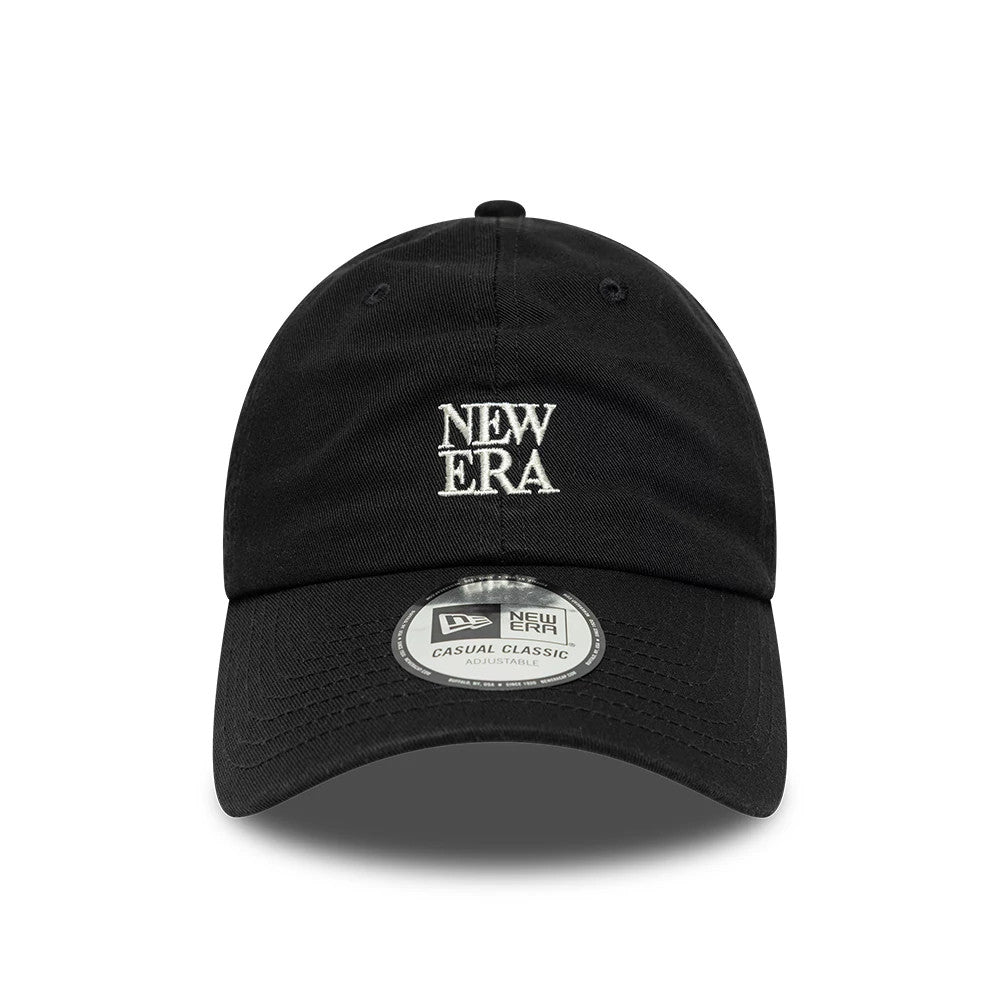 New Era Square Logo Black Casual Classic Adjustable Cap, front view showing the raised New Era logo embroidered in white on the centre of the black crown, with a round Casual Classic size sticker on the curved black visor.