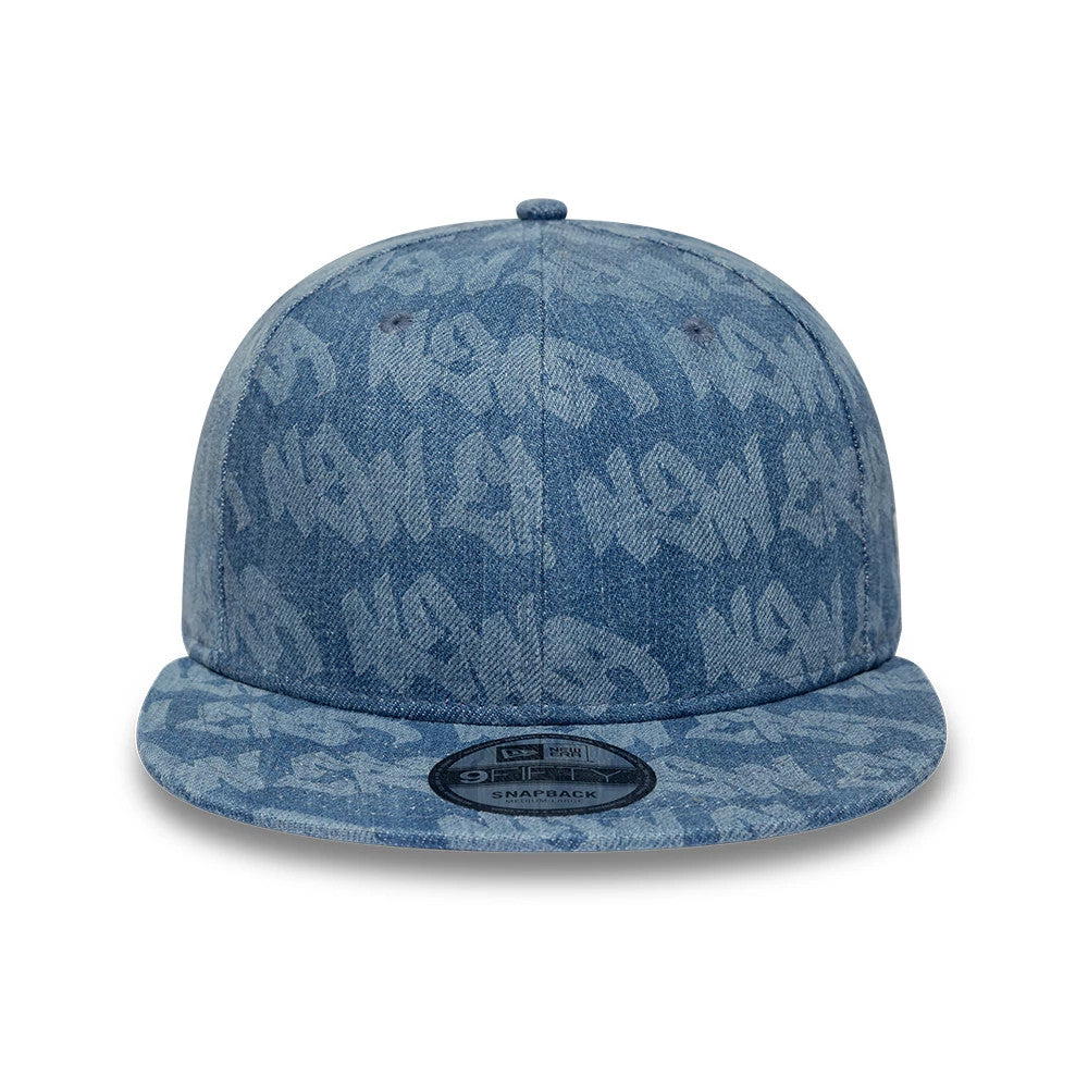 Pictured is this New Era Laser Burnout Washed Denim 9FIFTY Snapback Adjustable cap in navy. 3