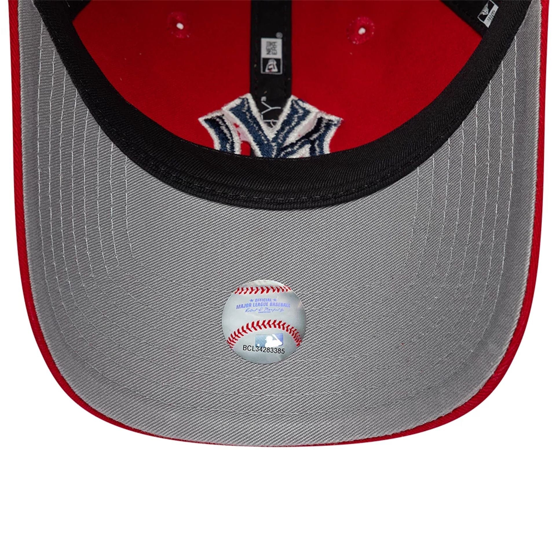 Pictured is this MLB New York Yankees 9FORTY Unstructured cap in red. 2