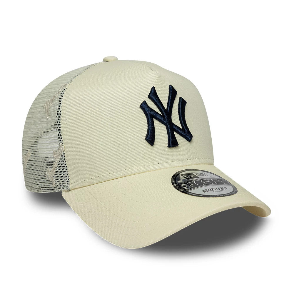 New York Yankees MLB Mesh Cream New Era 9FORTY A-Frame Trucker Adjustable Cap, front view with a raised navy NY logo on the cream front panel, mesh side panels, and a 9FORTY size sticker on the curved visor.