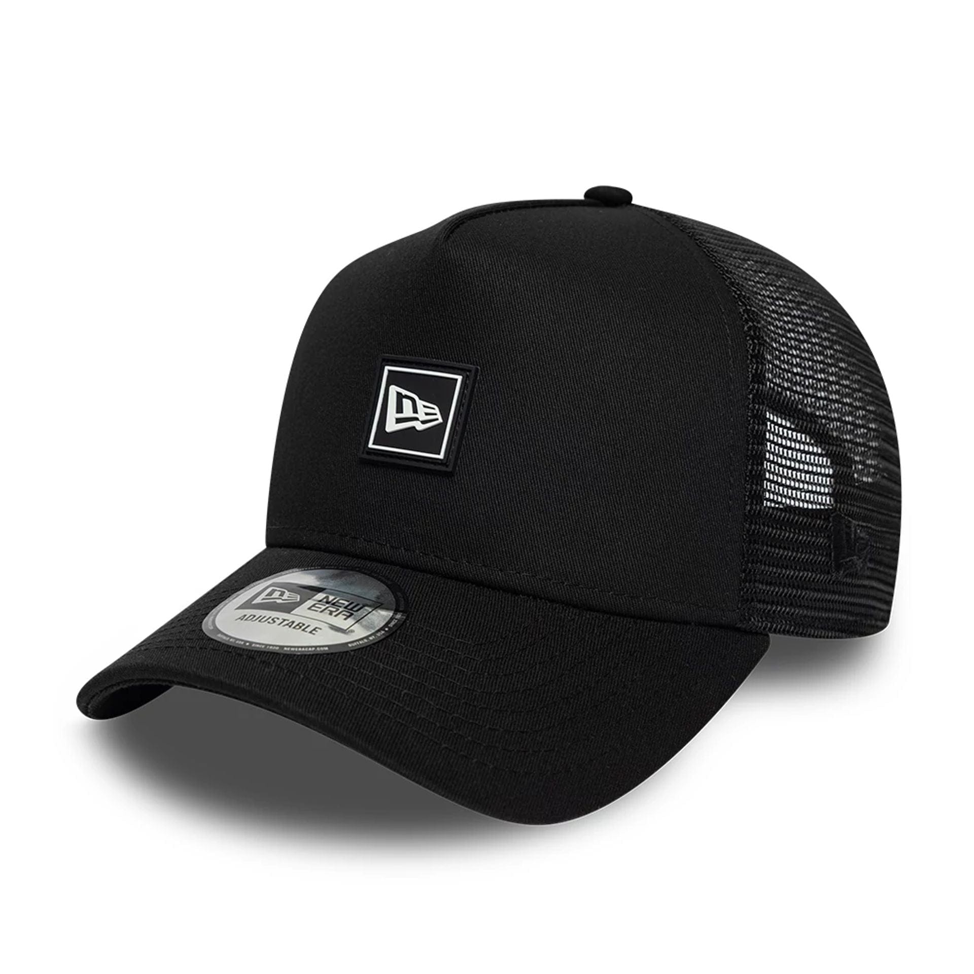 Pictured is this New Era Flag Patch 9FORTY A-Frame Trucker cap in black. 1