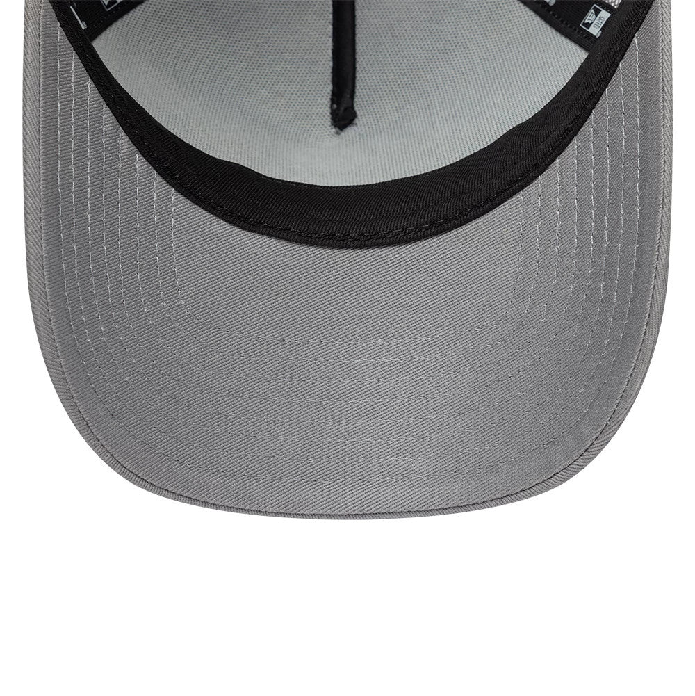 Pictured is this New Era Script 9FORTY A-Frame Trucker cap in grey. 7