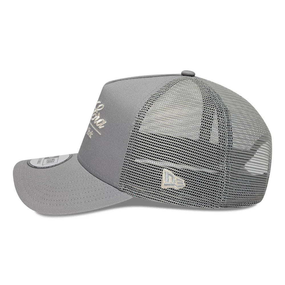 Pictured is this New Era Script 9FORTY A-Frame Trucker cap in grey. 4