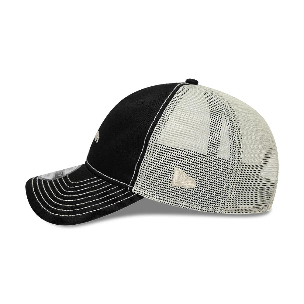 Pictured is this New Era Tagging Logo 9TWENTY Trucker cap in black. 4
