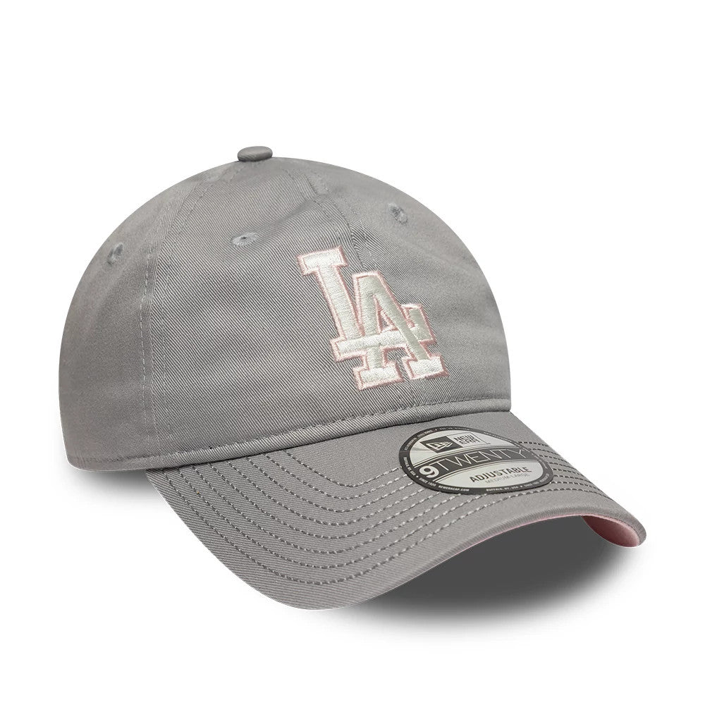 LA Dodgers MLB Sakura Nagashi Grey New Era 9TWENTY Adjustable Cap, front view showing the raised white LA logo with pink outline on the front panel and a 9TWENTY size sticker on the curved grey visor.