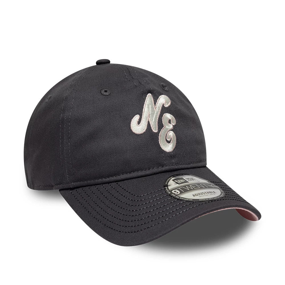 New Era Sakura Nagashi Dark Grey New Era 9TWENTY Adjustable Cap, three-quarter view showing the raised NE logo in white embroidery on the front panel, with a silver 9TWENTY size sticker on the curved visor.