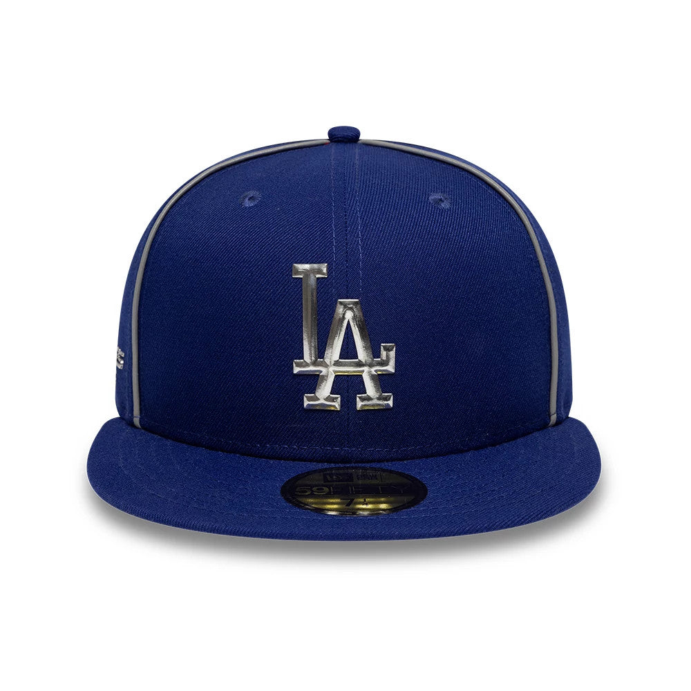 LA Dodgers Hajime Sorayama X MLB Dark Blue New Era 59FIFTY Fitted Cap, front view with a silver raised embroidered LA logo on the front panel, grey piping on the crown seams and a gold 59FIFTY size sticker on the visor.