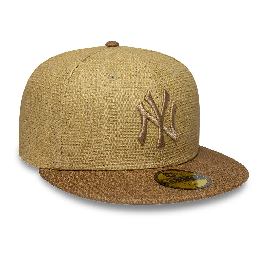 New York Yankees MLB Straw Beige New Era 59FIFTY Fitted Cap, three-quarter view showing the raised beige NY logo embroidered on the front panel, with a brown woven visor and the gold 59FIFTY size sticker on top.