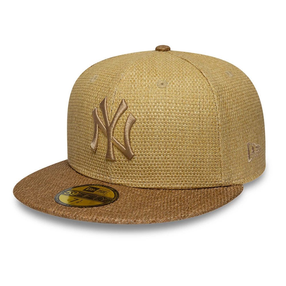 New York Yankees MLB Straw Beige New Era 59FIFTY Fitted Cap, three-quarter view showing a raised beige NY logo on the structured straw-textured crown, a brown visor with a gold 59FIFTY size sticker, and the New Era flag logo on the left side.