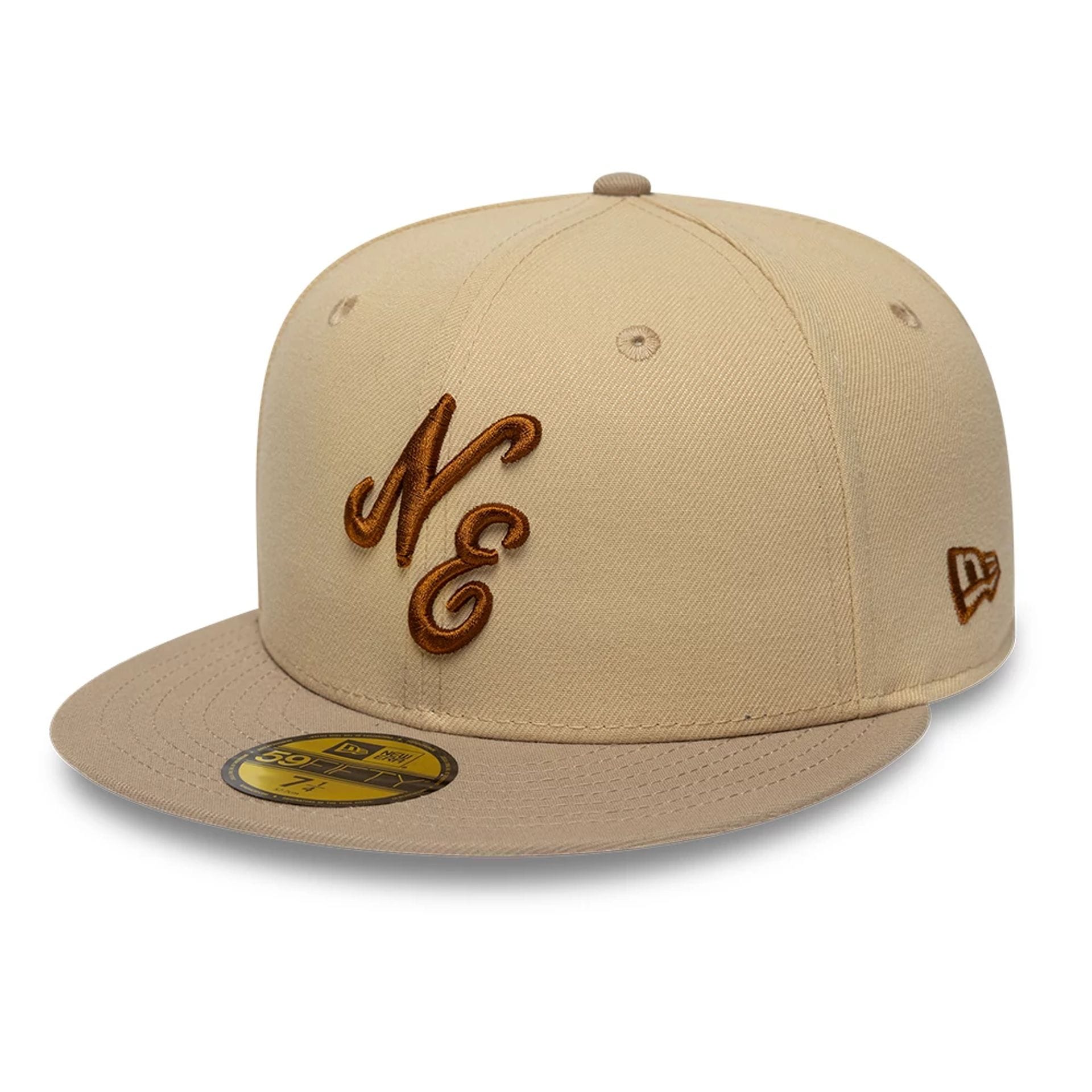 Pictured is this New Era Mocha Mousse 59FIFTY Fitted cap in light beige. 1