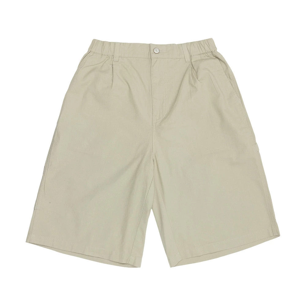 New Era Canvas Beige Bermuda Shorts, front view showing the flat front design with an elastic waistband, button closure at the top, angled side pockets, and knee-length hem on the beige canvas fabric.