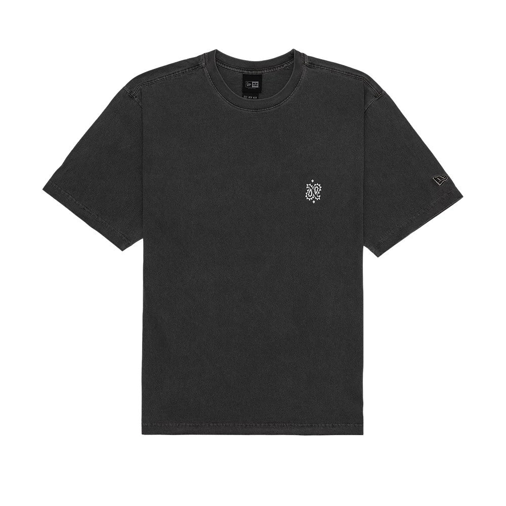 New Era Paisley Black T-Shirt, front view showing the black tee with a small white paisley design on the left chest, a raised New Era logo on the left sleeve, and a round neckline.
