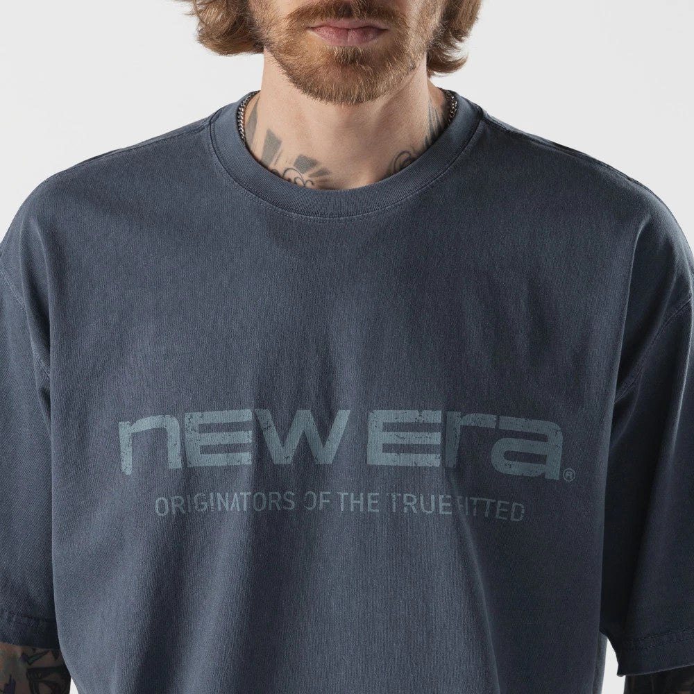The model is wearing this New Era Originators T-Shirt in navy. 3