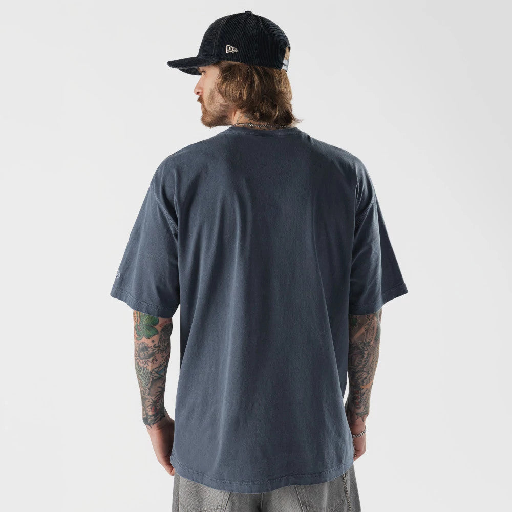 The model is wearing this New Era Originators T-Shirt in navy. 2