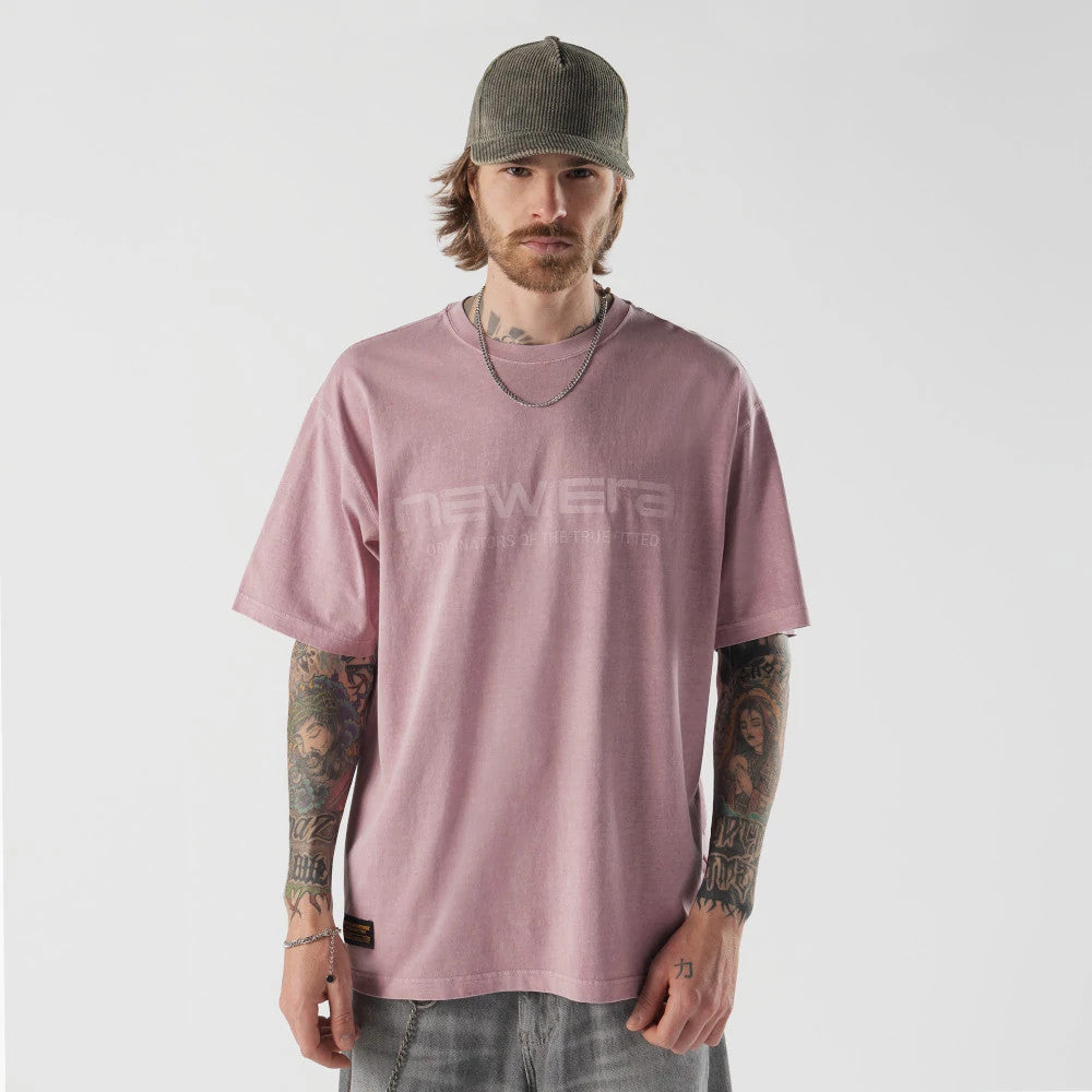 The model is wearing this New Era Originators T-Shirt in pink. 1