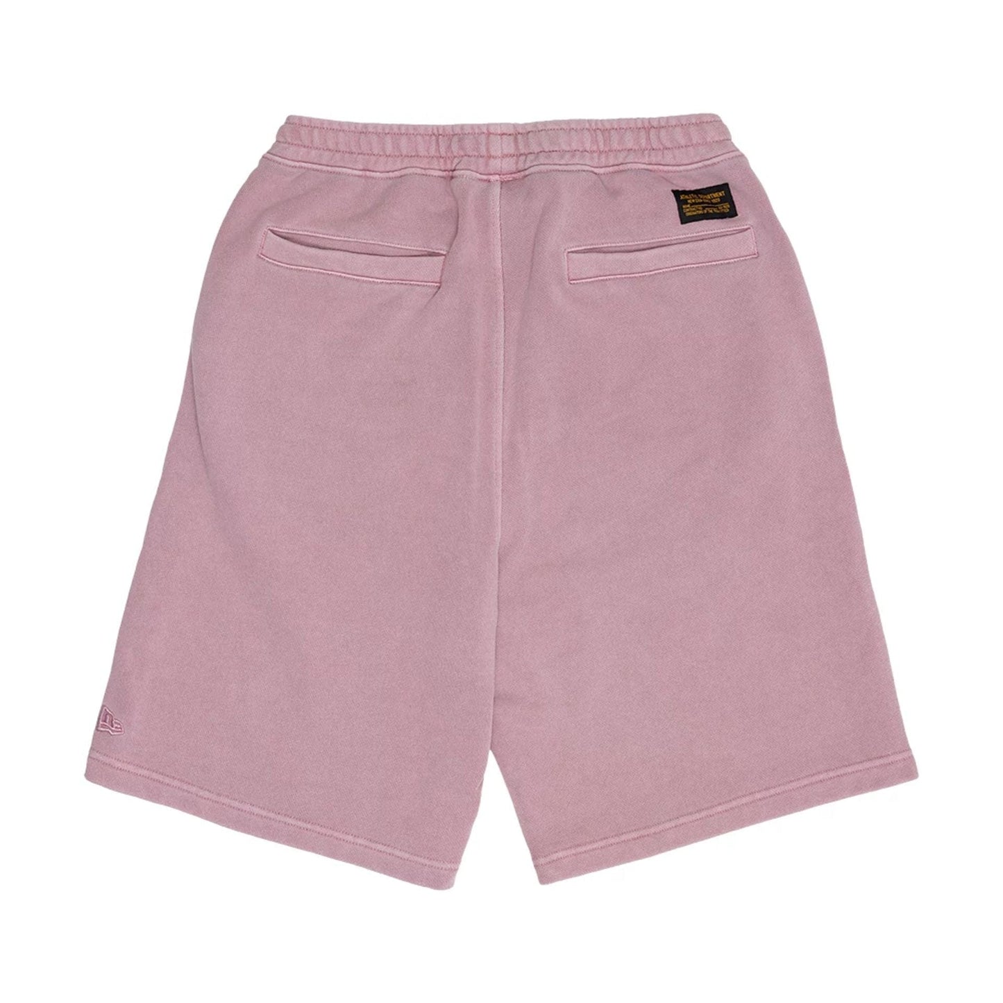 The model is wearing this New Era Originators Oversized Shorts in pink. 2