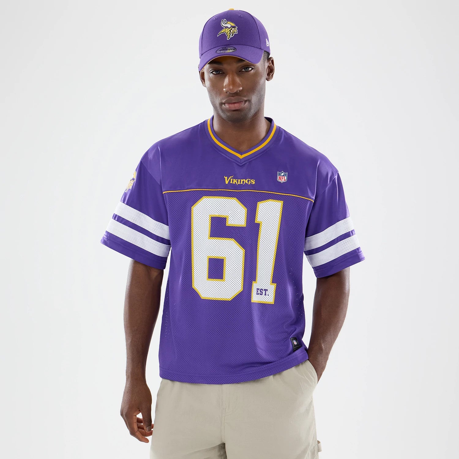 The model is wearing this NFL Minnesota Vikings Mesh Jersey in purple. 1