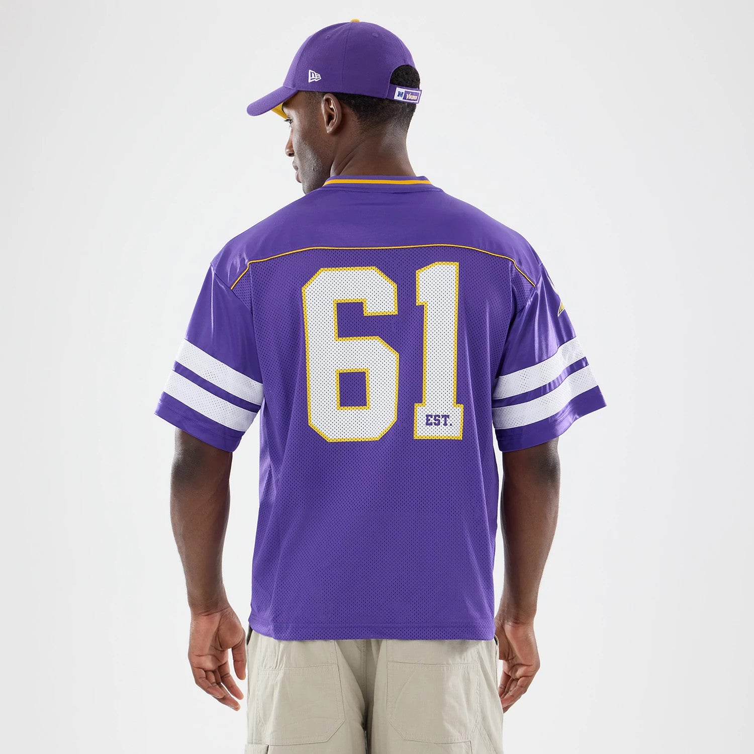 The model is wearing this NFL Minnesota Vikings Mesh Jersey in purple. 2
