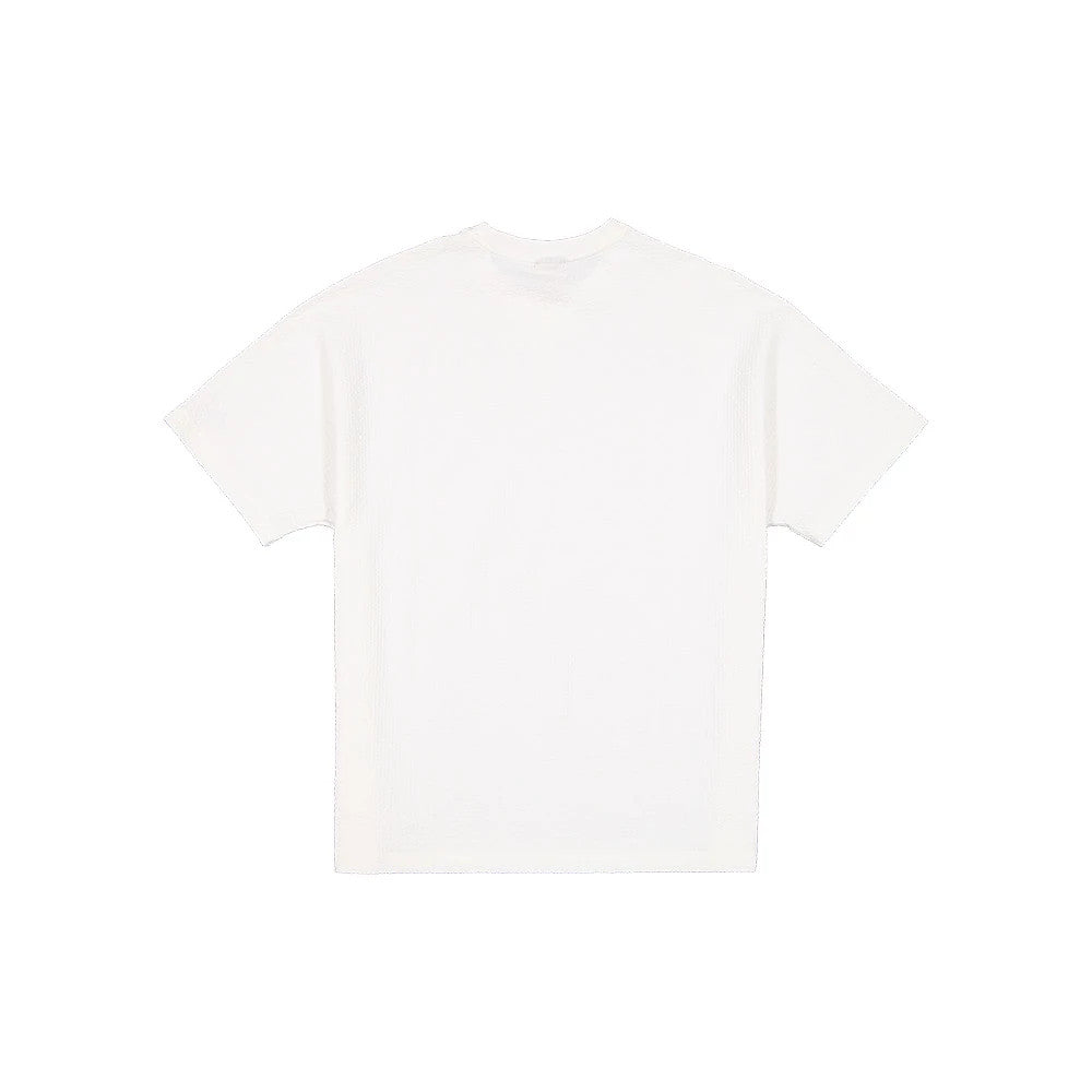 The model is wearing this New Era Black Label Seersucker T-Shirt in Cream. 2